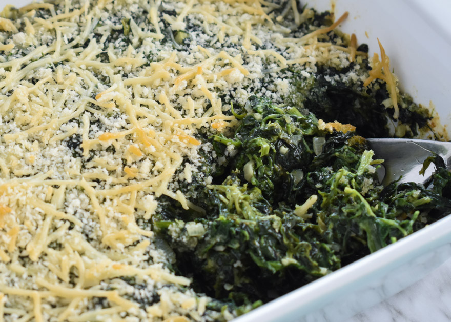 Creamed spinach with scoop