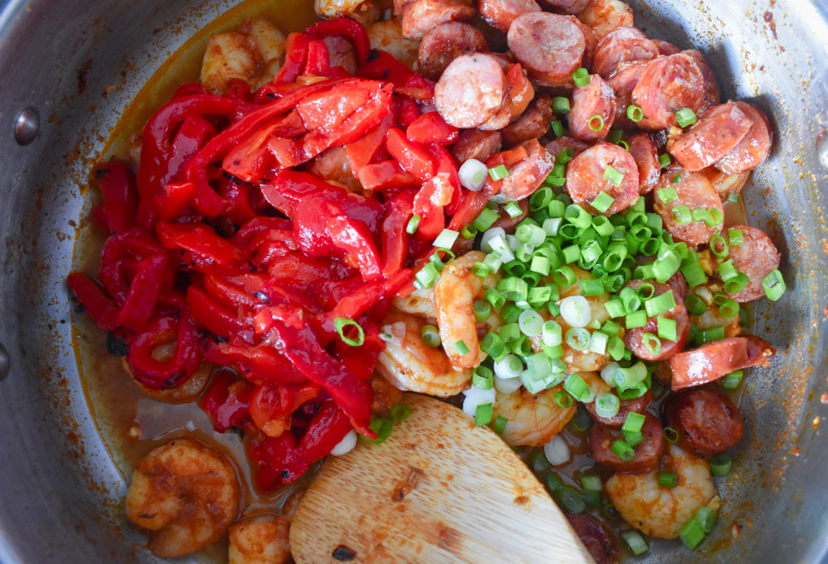 Sausage, shrimp, peppers, and green onion cooking