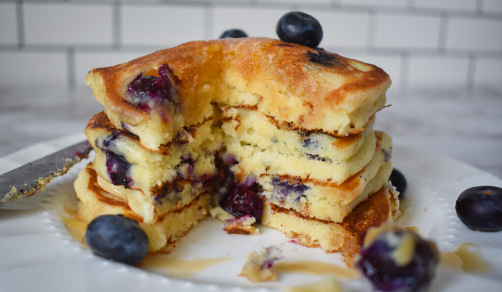 Lemon blueberry pancake stack half eaten